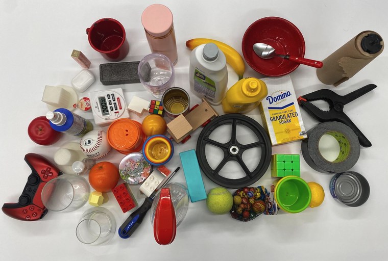 The open-world object set. Transparent and reflective items are included on purpose: they are where vision is least reliable.